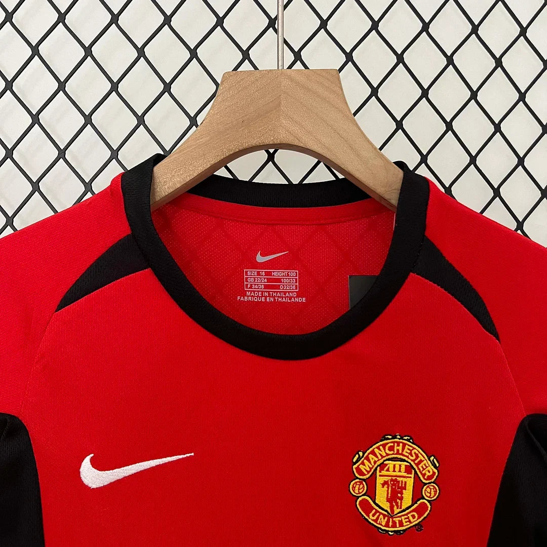 Taglia per bambini di Manchester United Home, stagione 2002/2004, versione rétro.
